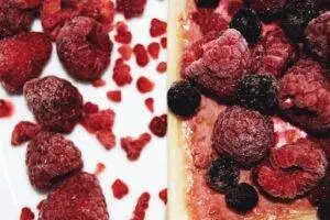 red and black fruit on white ceramic plate