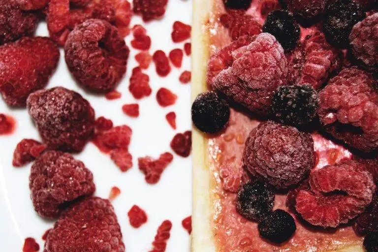 red and black fruit on white ceramic plate